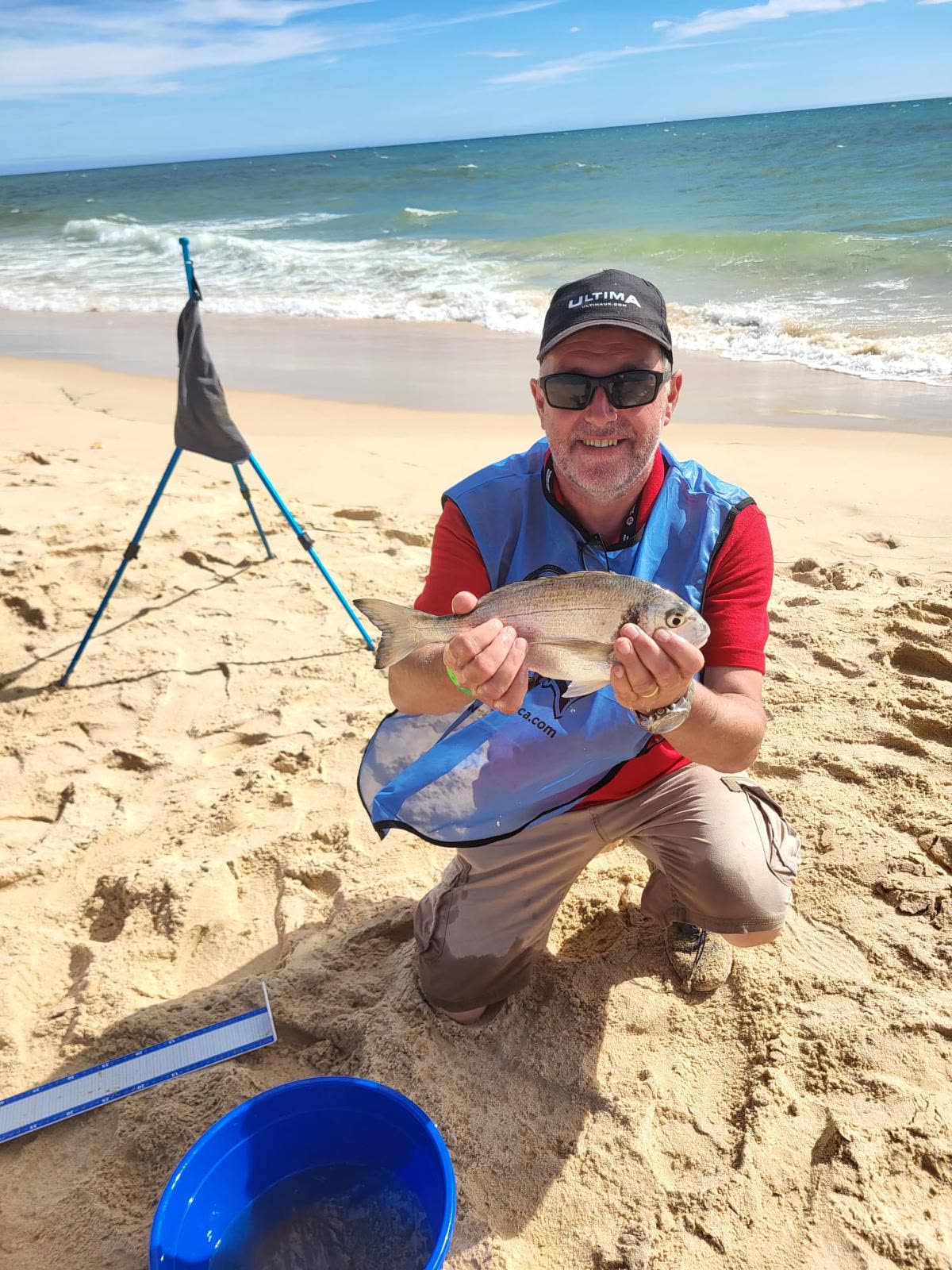 A competition fish, measured beside the peg