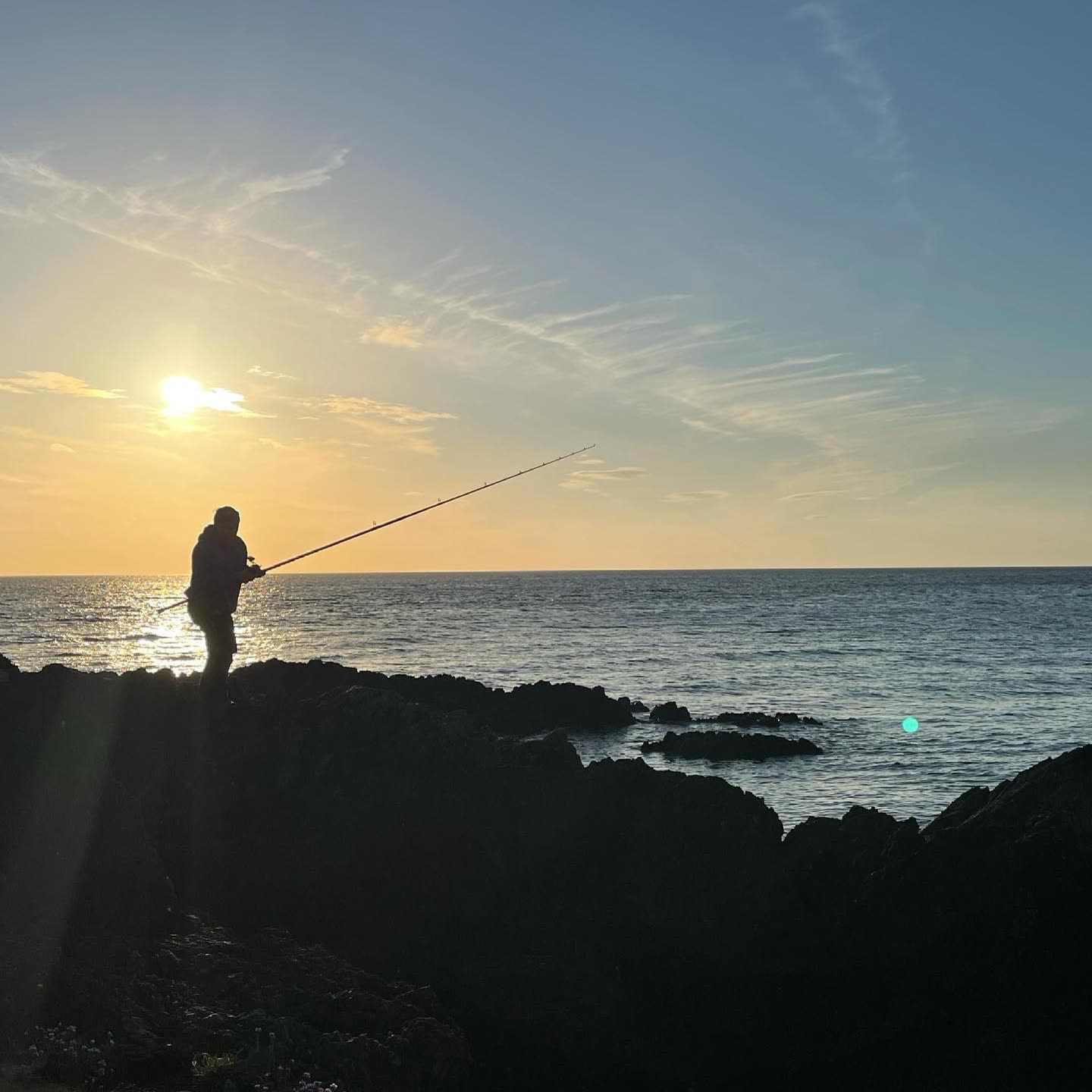 Dusk over the rocky Anglesey coastline
